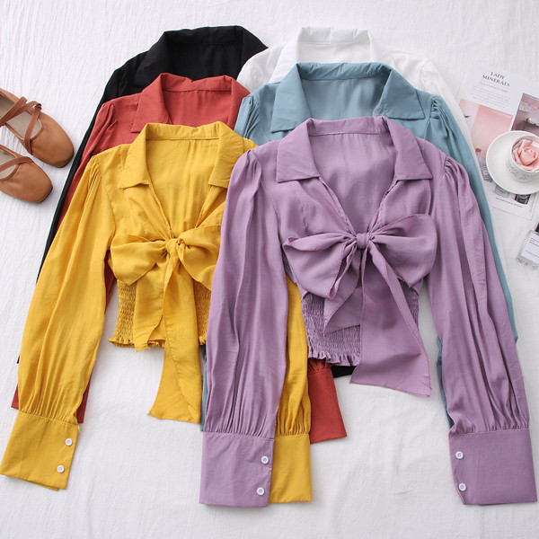 Uue mudeli naiste särk paela ja spitsikaelusega