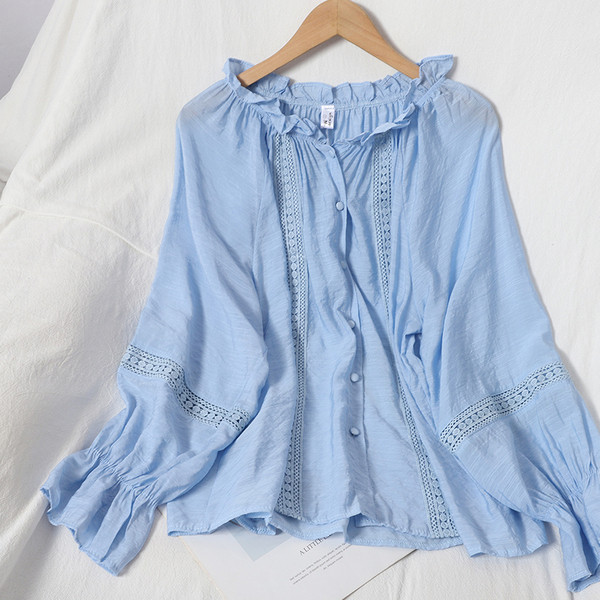 Női ing kerek nyakkivágással és gombokkal