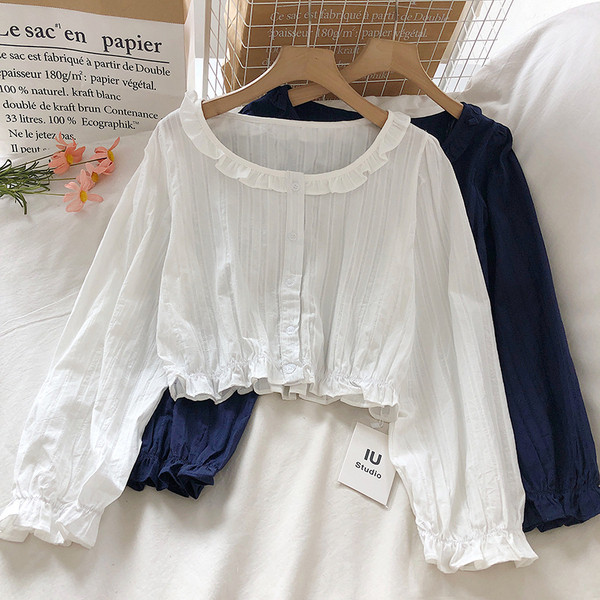 Női ing ovális nyakkivágással és hosszú ujjal