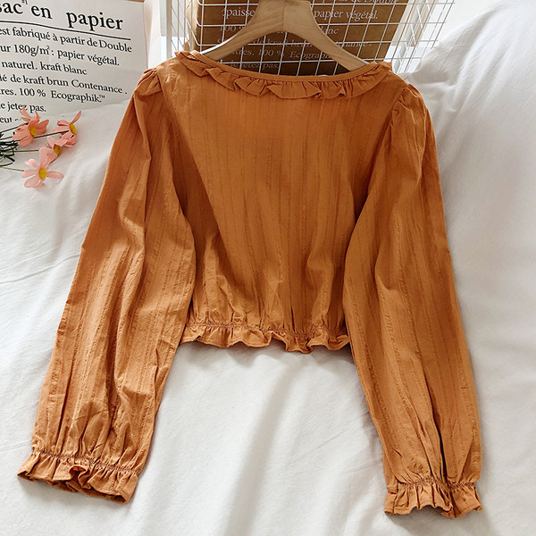 Női ing ovális nyakkivágással és hosszú ujjal