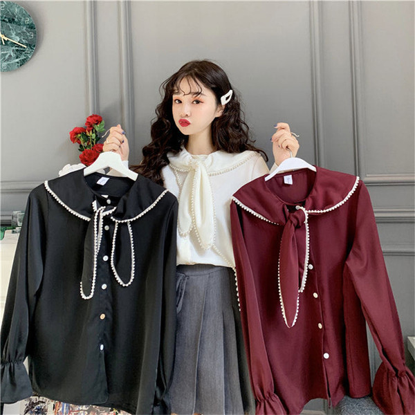 Stílusos női ing gyöngyökkel és hosszú ujjal