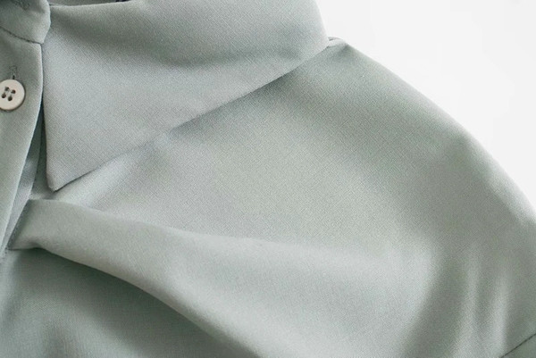 Νέο μοντέλο φθινοπωρινό πουκάμισο ασύμμετρο μοντέλο