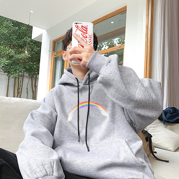 Kapuutsi, tasku ja värvilise aplikatsiooniga meeste dressipluus