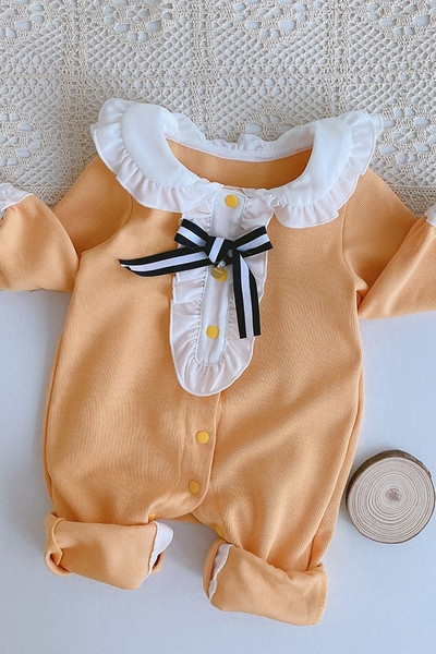 Kollane ovaalse kaelusega beebikombinesoon