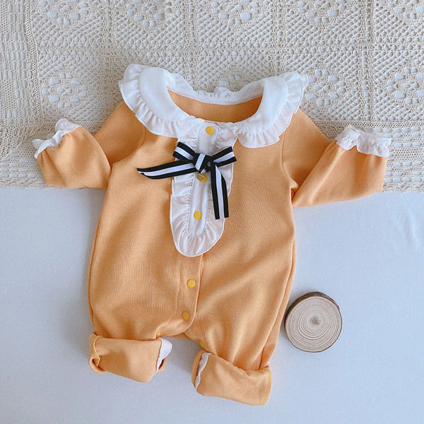 Kollane ovaalse kaelusega beebikombinesoon