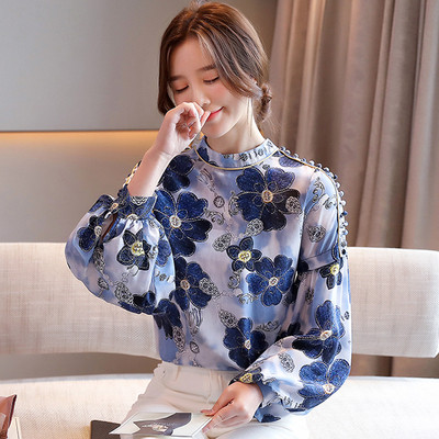 Laiade varrukatega ja lillelise mustriga naiste särk