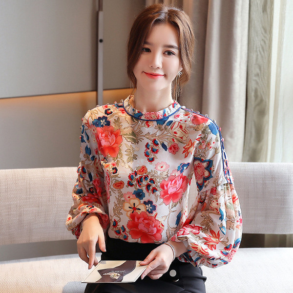 Laiade varrukatega ja lillelise mustriga naiste särk