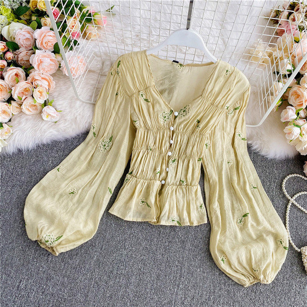 Naiste nööpide ja lillemustriga särk