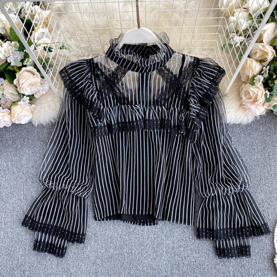 Moodne kõrge krae ja läbipaistvate varrukatega naiste särk