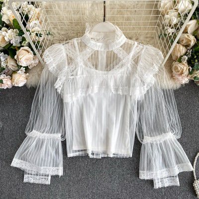 Moodne kõrge krae ja läbipaistvate varrukatega naiste särk