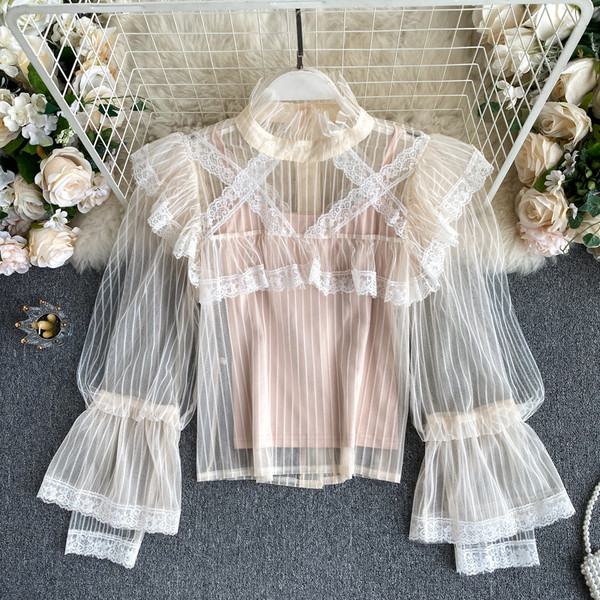 Moodne kõrge krae ja läbipaistvate varrukatega naiste särk