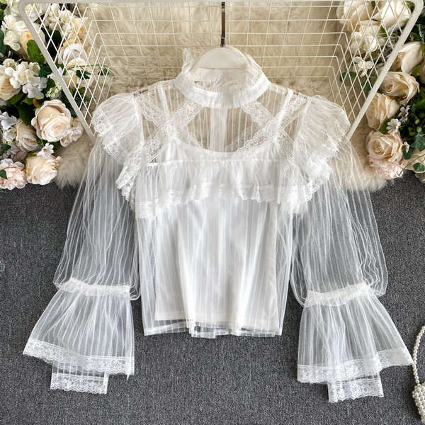 Moodne kõrge krae ja läbipaistvate varrukatega naiste särk