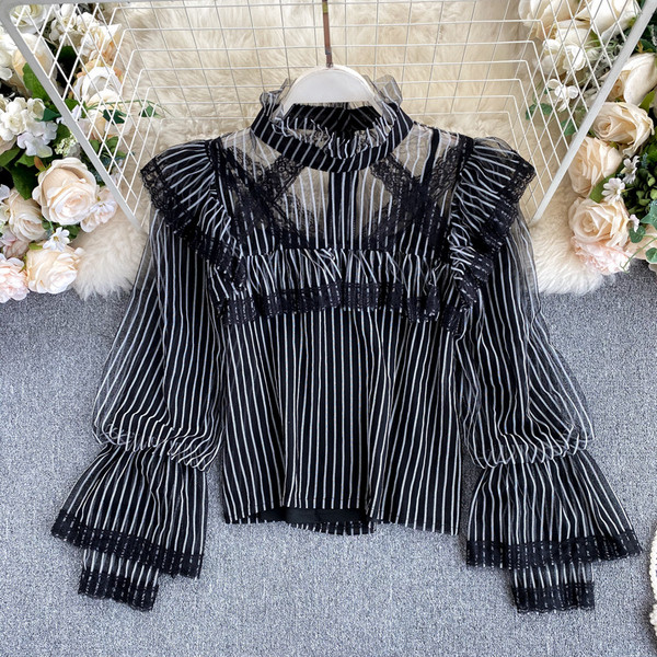 Moodne kõrge krae ja läbipaistvate varrukatega naiste särk