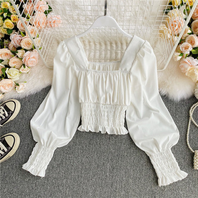 Naiste elastse ja kandilise kaelusega särk