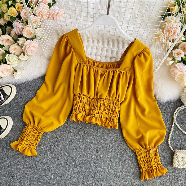 Naiste elastse ja kandilise kaelusega särk