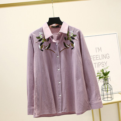 Suures suuruses pikkade varrukate ja tikanditega naiste särk