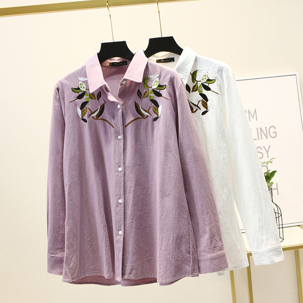 Suures suuruses pikkade varrukate ja tikanditega naiste särk