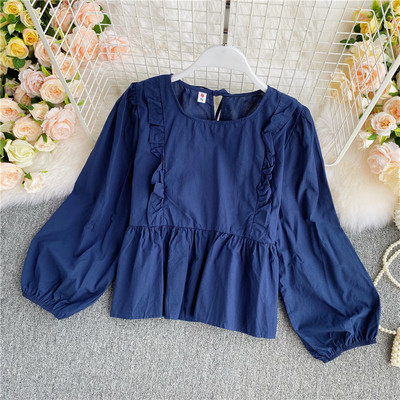 Alkalmi női ing kerek nyakkivágással és fürtökkel