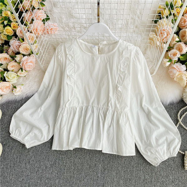 Alkalmi női ing kerek nyakkivágással és fürtökkel