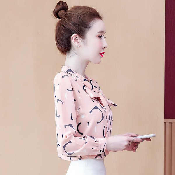 Uue mudeli lipsude ja mustriga naiste särk