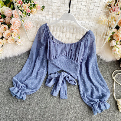 Modern női ing ovális nyakkivágással és szalaggal a hátán