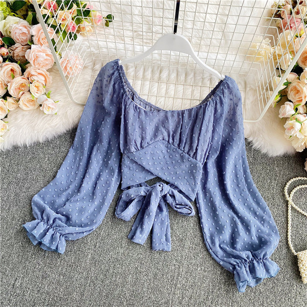 Modern női ing ovális nyakkivágással és szalaggal a hátán