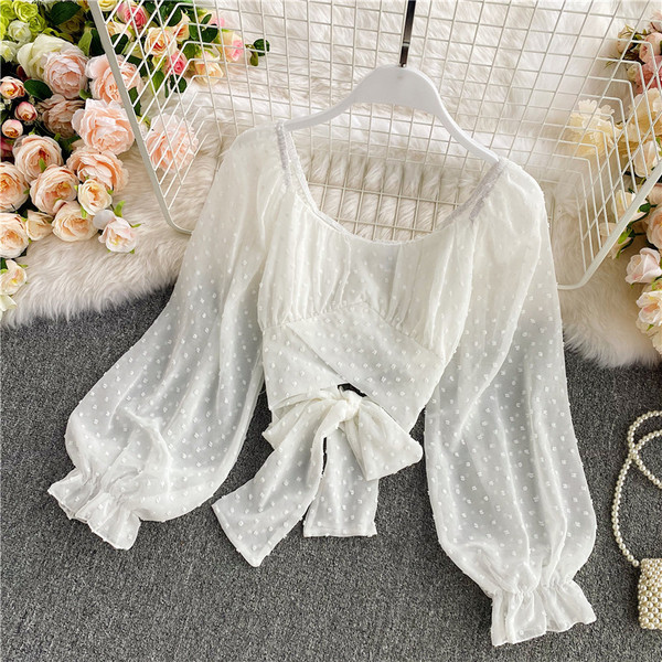 Modern női ing ovális nyakkivágással és szalaggal a hátán