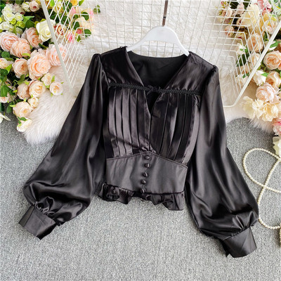 Elegantna ženska košulja i V-izrez s gumbima