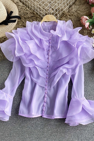 Modern női ing fürtökkel és lótusz ujjakkal