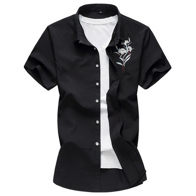 Kaasaegne meeste särgi mudel tikanditega