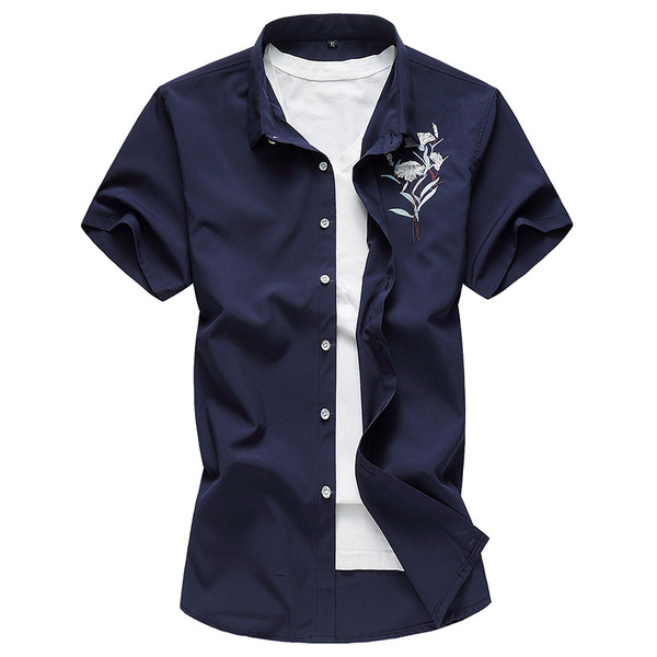 Kaasaegne meeste särgi mudel tikanditega