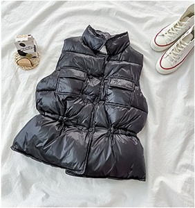 Női alkalmi mellény gumírozott derékkal és zsebekkel