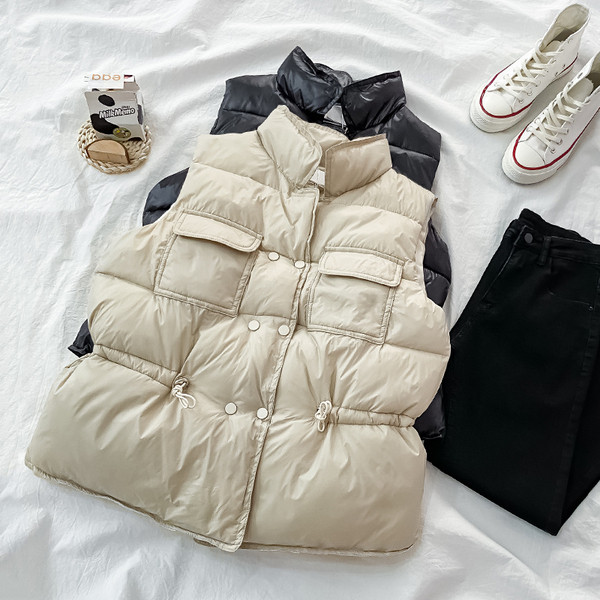 Női alkalmi mellény gumírozott derékkal és zsebekkel