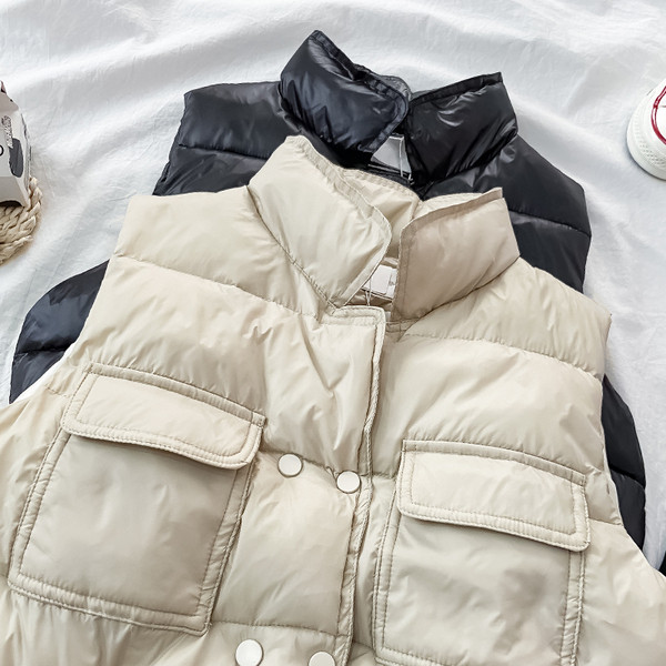 Női alkalmi mellény gumírozott derékkal és zsebekkel