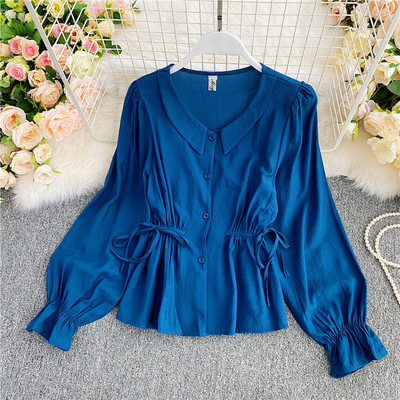 Μοντέρνο γυναικείο πουκάμισο με κουμπιά και κορδόνια στη μέση