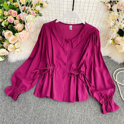 Μοντέρνο γυναικείο πουκάμισο με κουμπιά και κορδόνια στη μέση