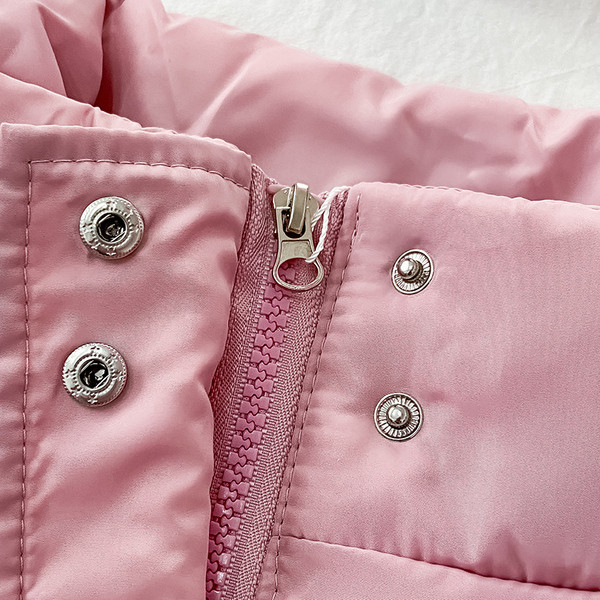 Női mellény ovális gallérral és zsebekkel