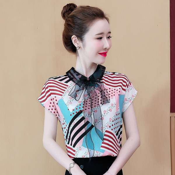 Uue mudeli tülli ja lühikeste varrukatega naiste särk