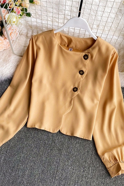 Naiste ümara kaeluse ja nööpidega särk