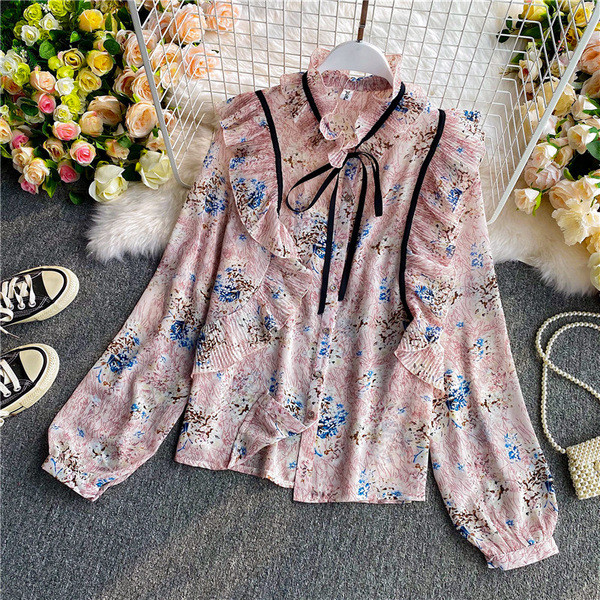 Lillemustri ja lokkidega naiste särk