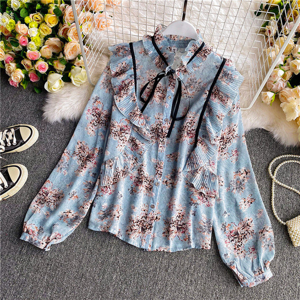 Lillemustri ja lokkidega naiste särk