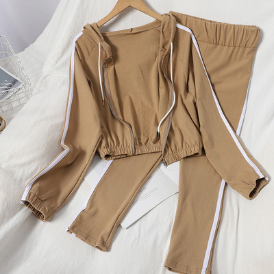 Naiste sportlik-vabaaja komplekt kaheosaline valge äärisega