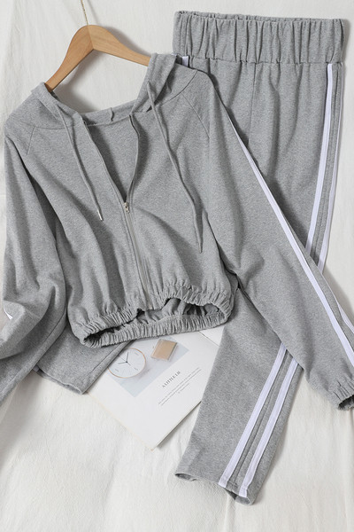 Naiste sportlik-vabaaja komplekt kaheosaline valge äärisega