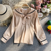 Alkalmi női ing gallérján szalaggal