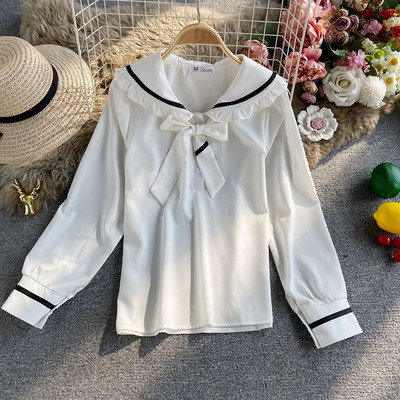 Alkalmi női ing gallérján szalaggal