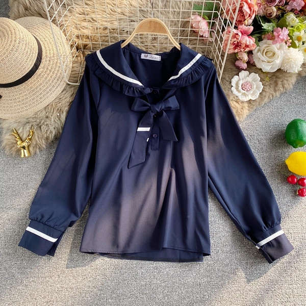 Alkalmi női ing gallérján szalaggal