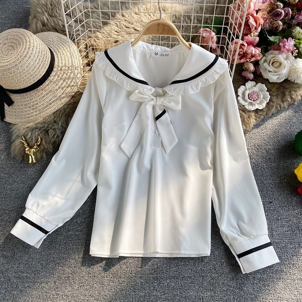 Alkalmi női ing gallérján szalaggal