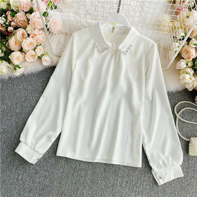 Naiste särk klassikalise kraega ja erinevates värvides pärlitega