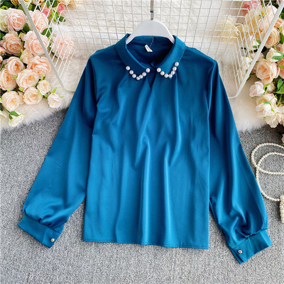 Naiste särk klassikalise kraega ja erinevates värvides pärlitega