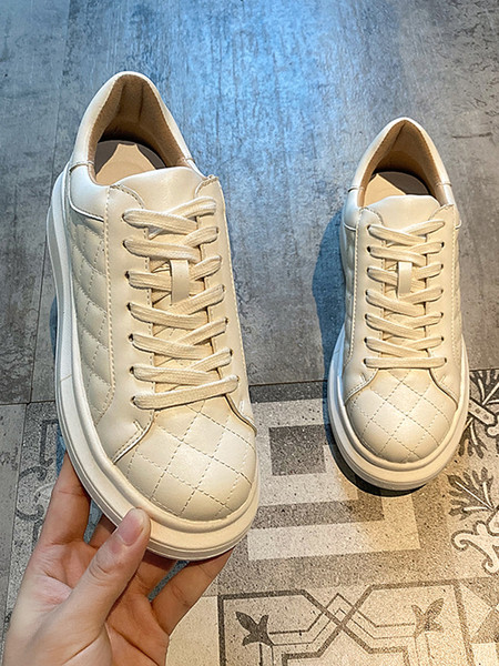 Női alkalmi bőr tornacipő fűzővel és lapos talppal